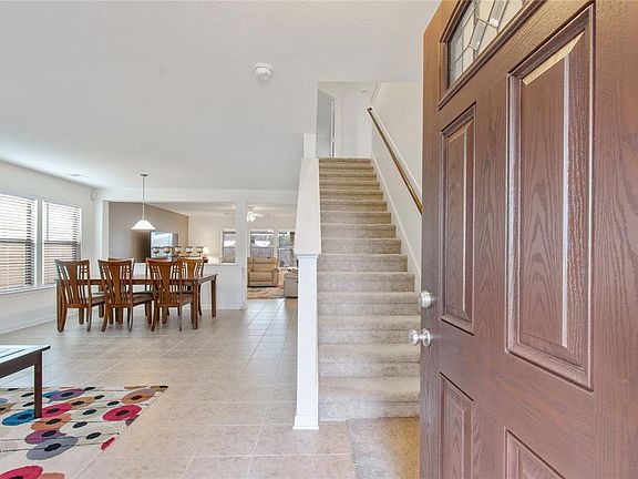 Open entrance with neutral colors throughout