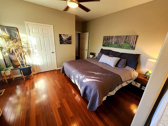 Master Bedroom with walk-in and in-room bathroom suite including garden tub.