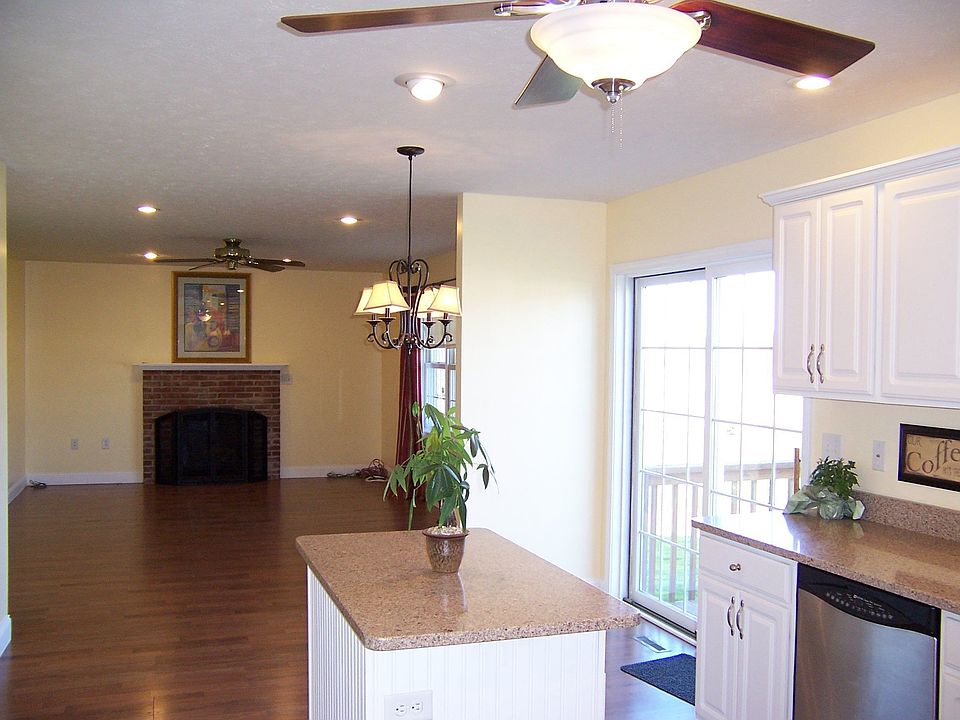 Kitchen looking to familyroom -notice the quartz solid surface countertops