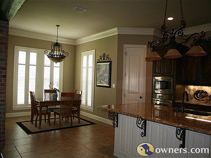 Breakfast room with beautiful lighting and walk-in pantry