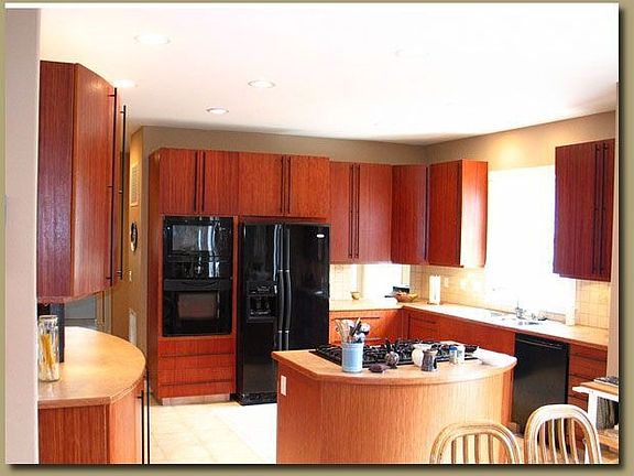 Owner/Builder designed African Rosewood cabinets