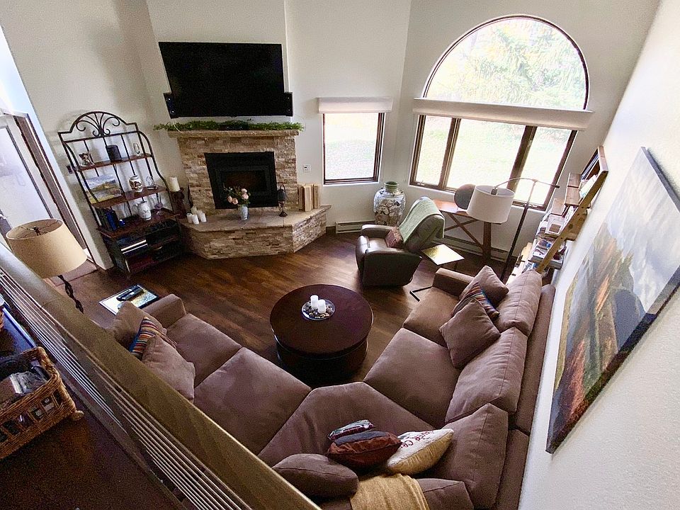 Living room.... large flat screen TV can be lowered when fireplace is not in use.