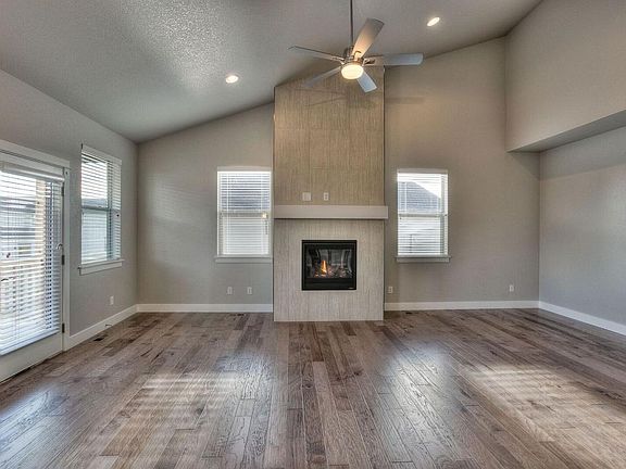 TV mount included. Installed above fireplace.