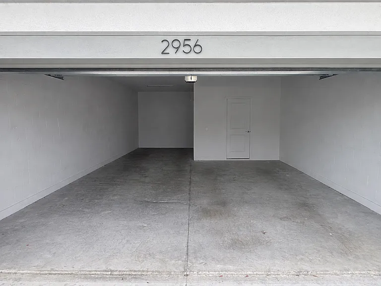 3 Car Garage w EV Charging Station