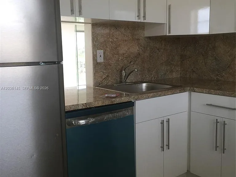 7722 Camino Real E #415 — Photo 4