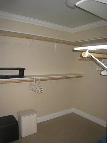 view of large walk in master closet