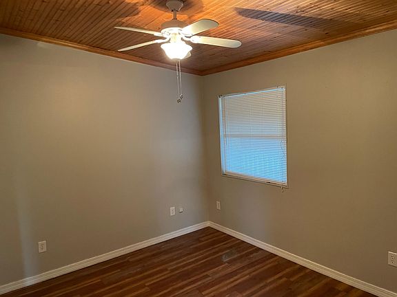 One of two bedrooms with closet