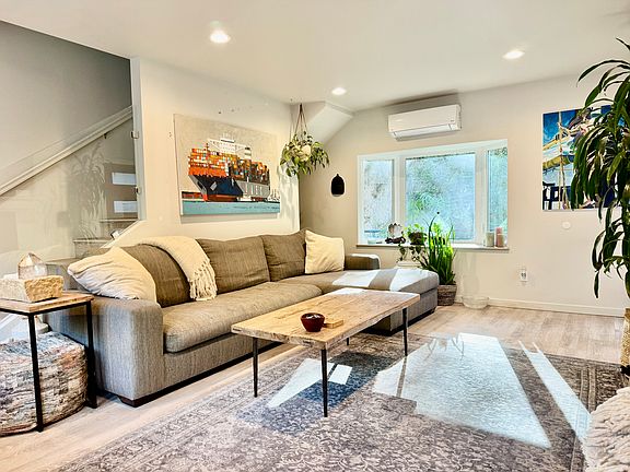 The living room with The Big Sur sofa from Pottery Barn with antique coffee table.