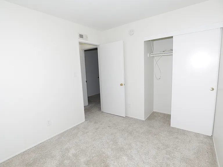 Second bedroom with slding door closet
