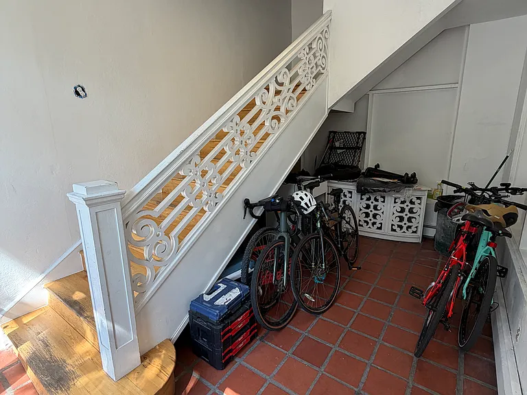Building entry, with secure bike storage.