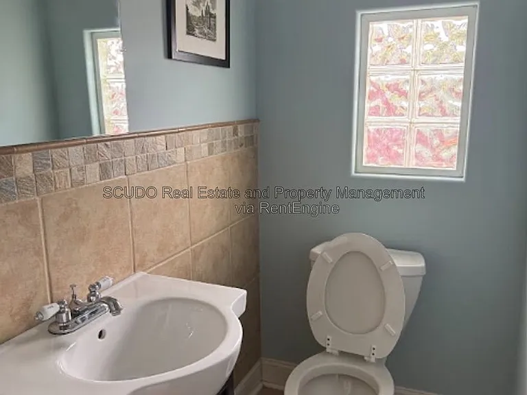 418 E 63rd Ter — Photo 12