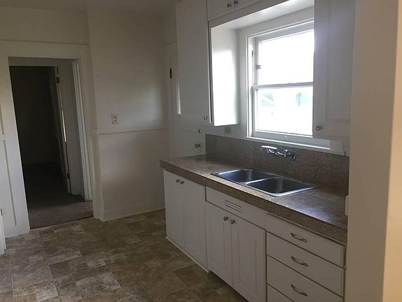 Kitchen looking toward bedroom. 