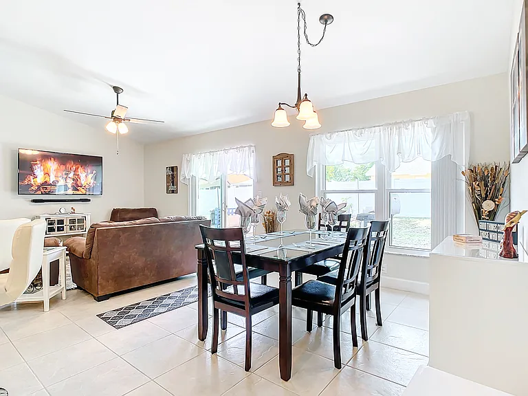 Dining area and living room area sliding door to the big back yard closed in private fenced.