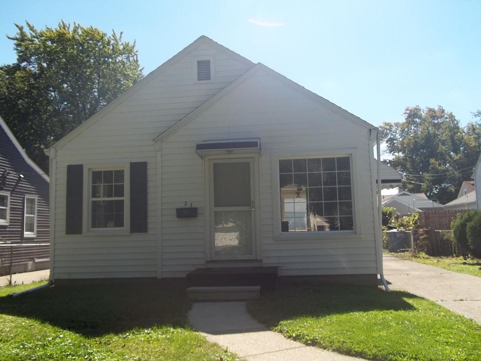 Charming front door with large picture window
