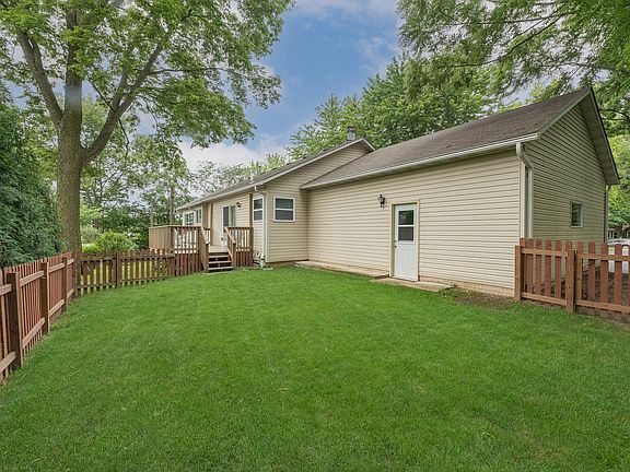 This area of the backyard has been fenced, and is ideal for a play yard for kids or pets!