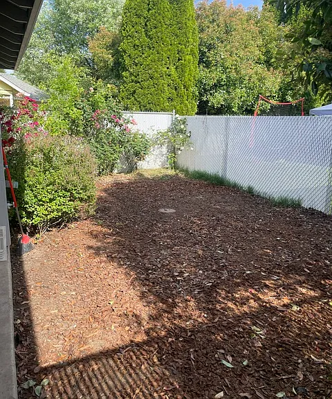 Fenced-in lower maintenance backyard