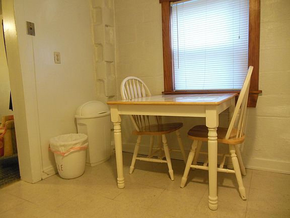 Kitchen: table with 2 chairs