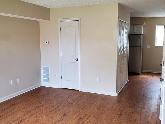 Living area, access to Kitchen.