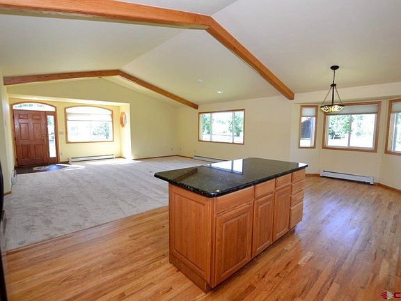 View from kitchen looking into great room on south side of house.