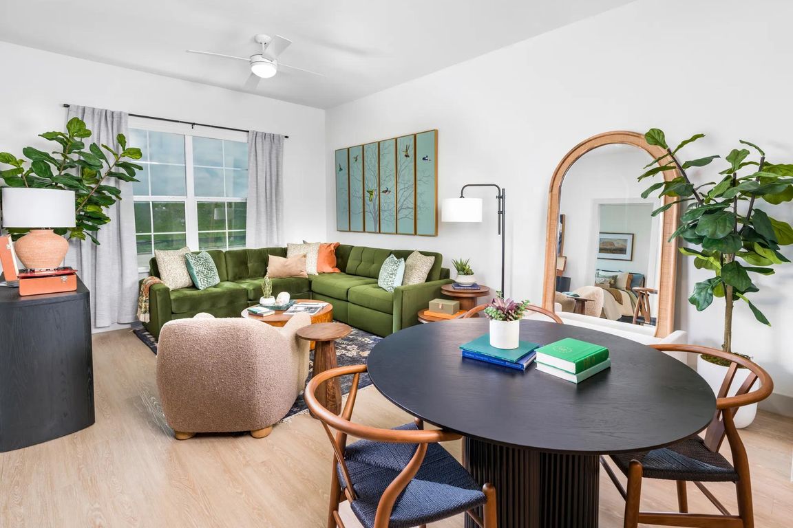 Thoughtfully designed living areas feature wood-style flooring and smart tech for effortless living.