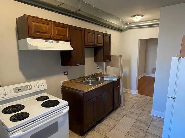 7737 S Yates Blvd — Photo 7