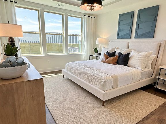 Main Level Owner s Suite with an Abundance of Natural Light