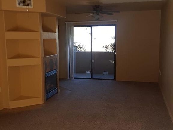 living room and rear patio