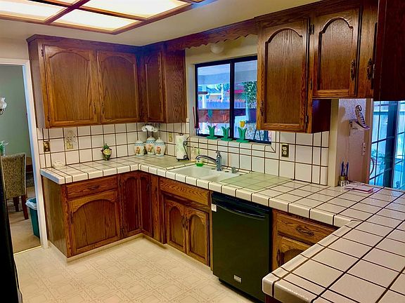 Convenient access to dining room and family room. Pleasant view to backyard patio.