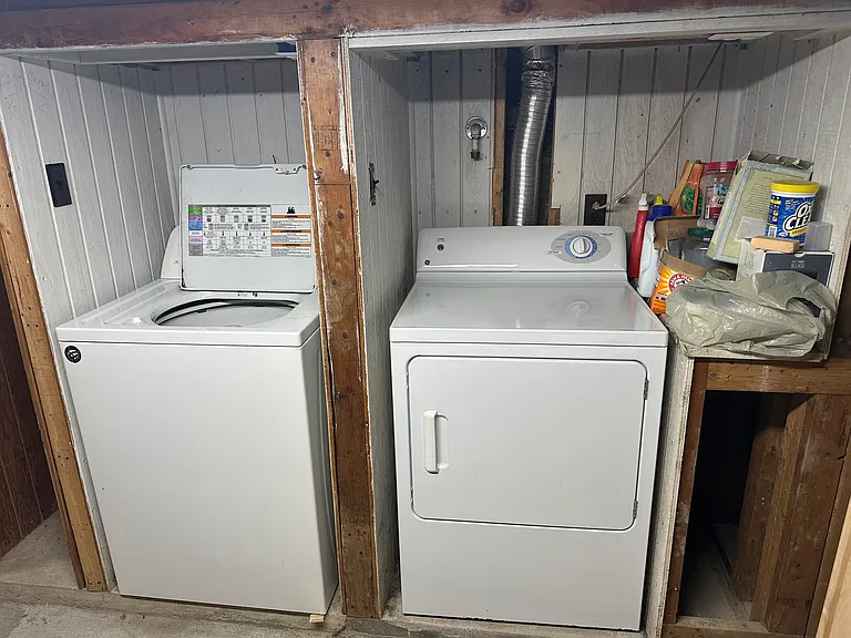 Shared laundry machines in basement.
