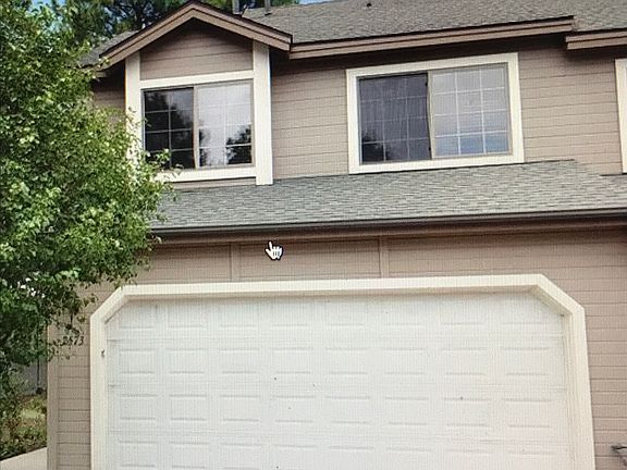 End unit with 2 space in garage and 2 in driveway