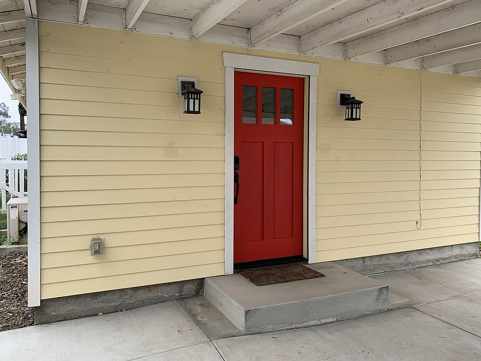 View of front door from carport