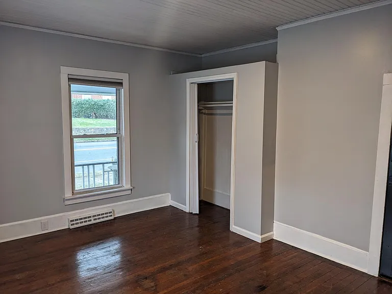 one bedroom and closet, small supplemental storage closet to side