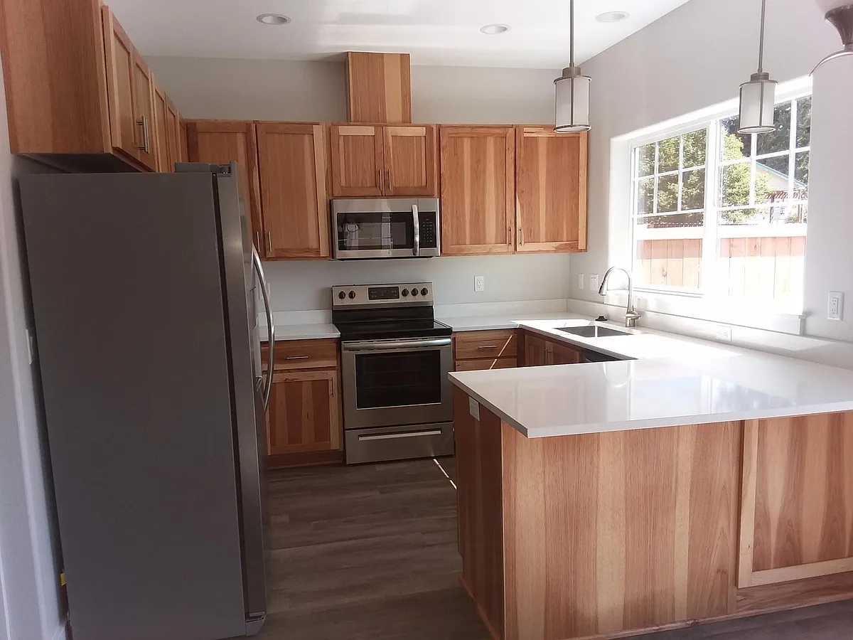 kitchen with stainless steel appliances - 1146 Mariel Pl S