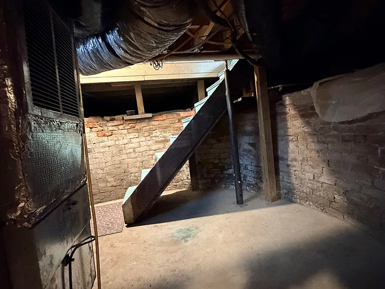 clean utility area with crawl space and additional storage