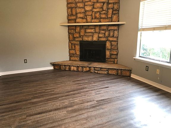 Charming Living room with half bath attached.