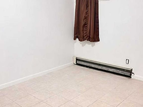 2nd image of 61-47 231st St #Basement