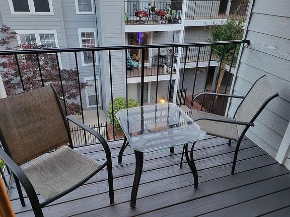 Balcony with included chairs and table
