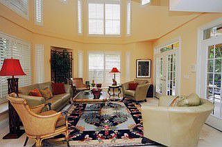 living room with double height ceiling