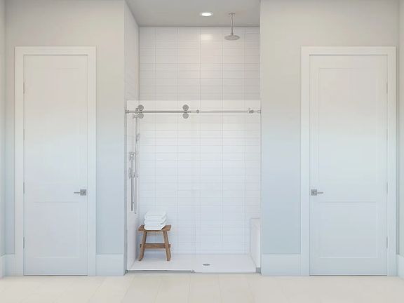 Primary bath with glass shower enclosure