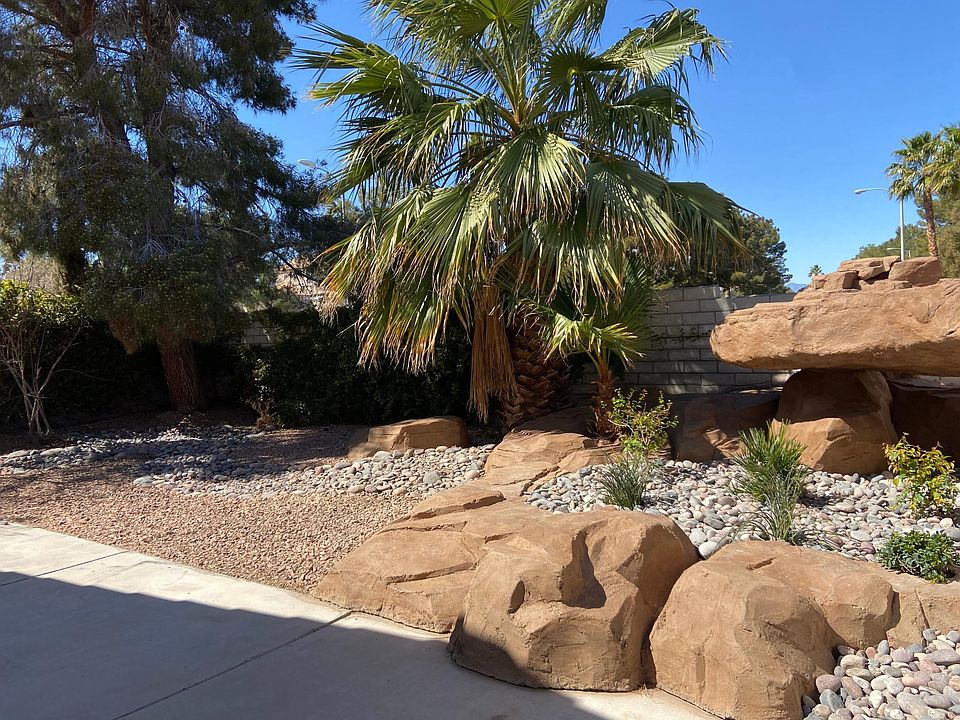 Take a peak at the Professionally landscaped & maintained back yard.