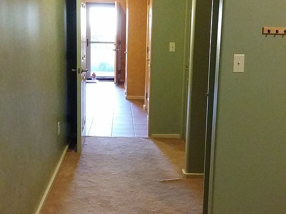 Taken from the master bedroom, looking down hallway to front