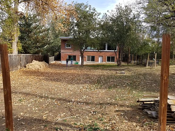 huge back yard with private alley access . great for a camper or extra vehicle. Can fence in entire yard for dog