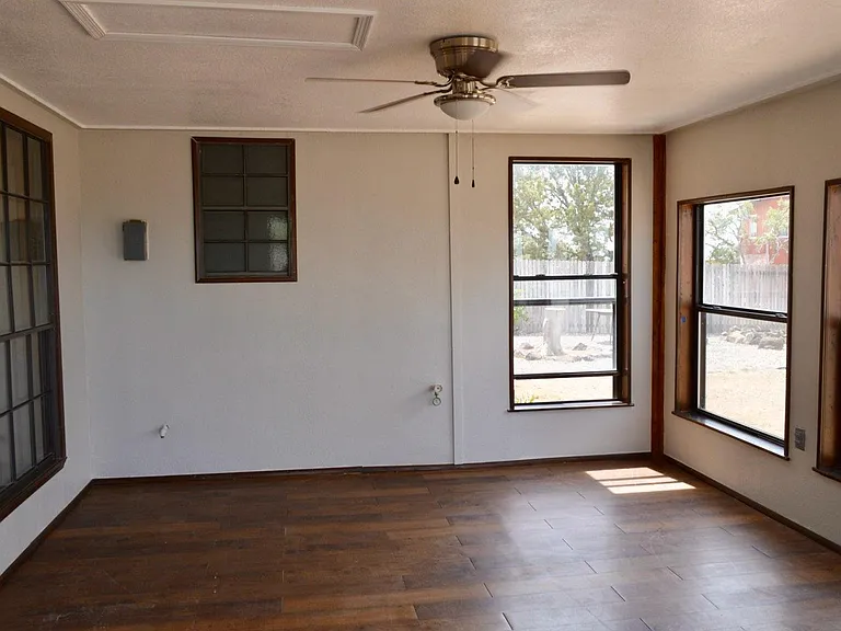 Sun Room-enclosed porch.