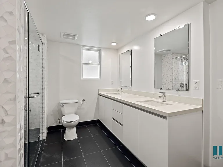 Large-Size Bathroom with Bathtub, Walk-In Shower, and Double-Sink Vanity with Cabinet Storage