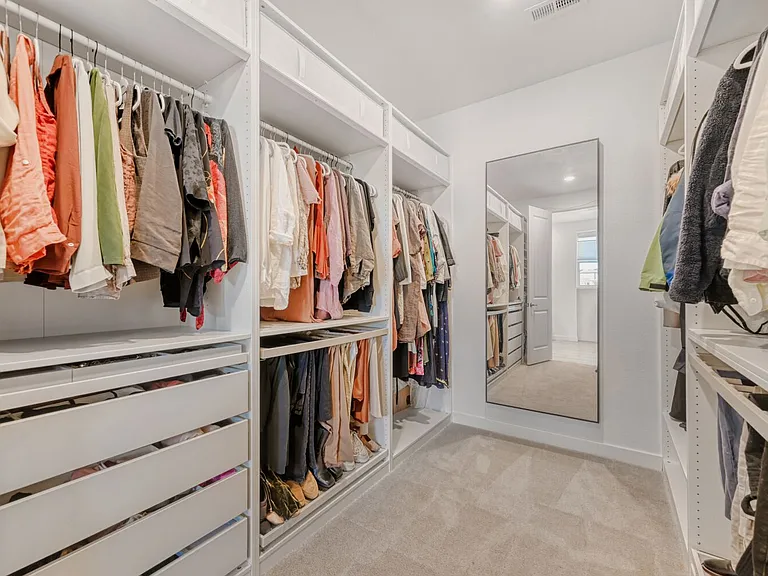 Master Walk in Closet with Built ins