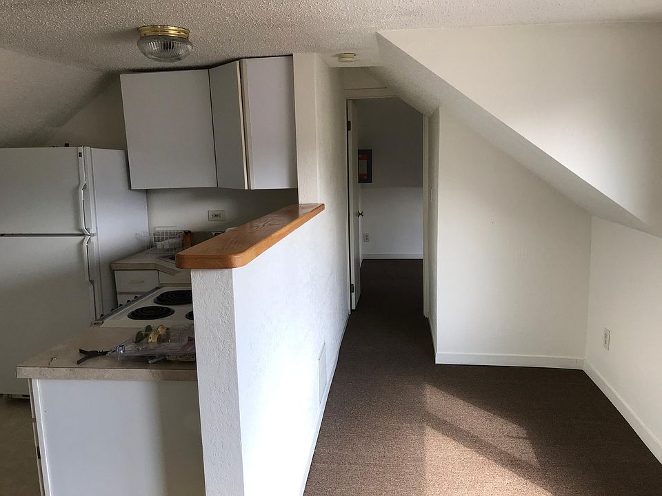 Looking down the hall to the bedroom and bathroom.