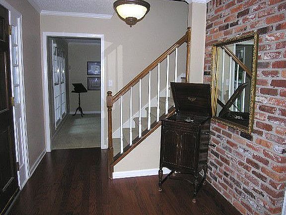 Foyer with Brick Accent Wall