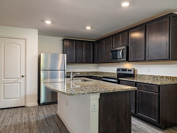 The chef-ready kitchen features energy-efficient appliances