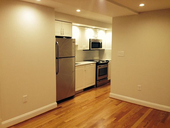 Full kitchen with dishwasher and garbage disposal