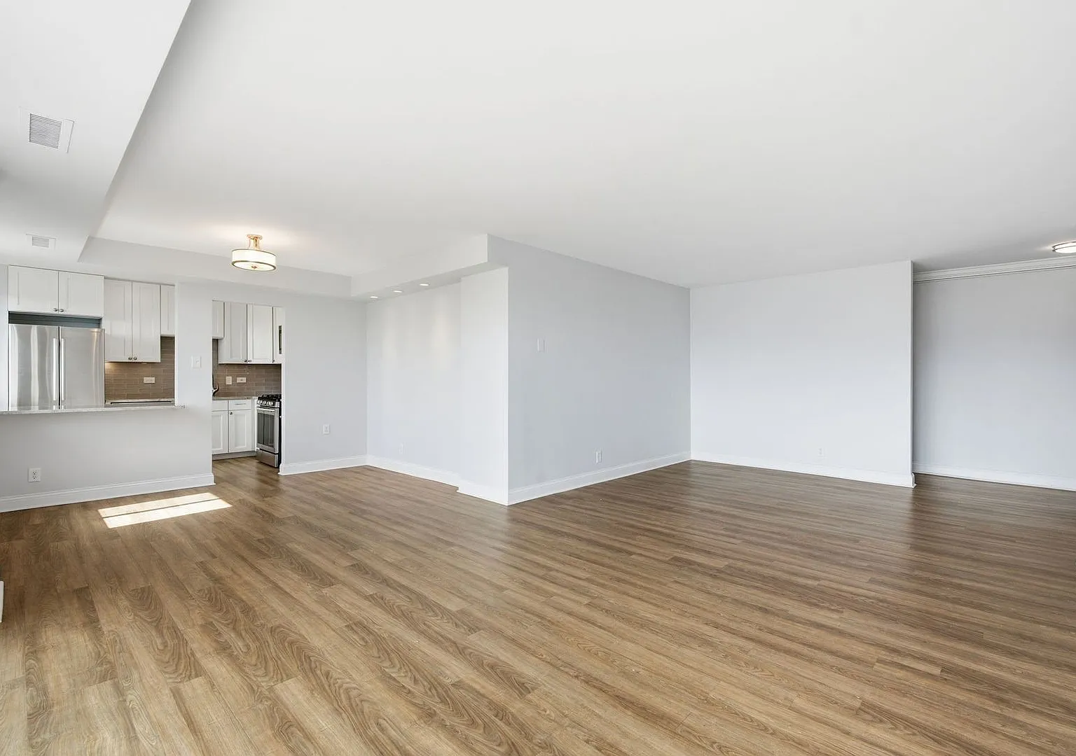 Bright Top-Floor 2BR Condo in The Whitehall with Garage Parking! — Photo 3